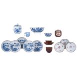Various Chinese blue and white and café au lait polychrome floral decorated cups and saucers and two