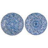 Two Chinese blue and white plates, both sides floral decorated, Kangxi, H 4,5 - ø 36 - 39 cm