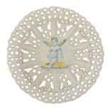 A Dutch Delftware openwork plate, the centre depicting a blue and white and yellow decorated angel,