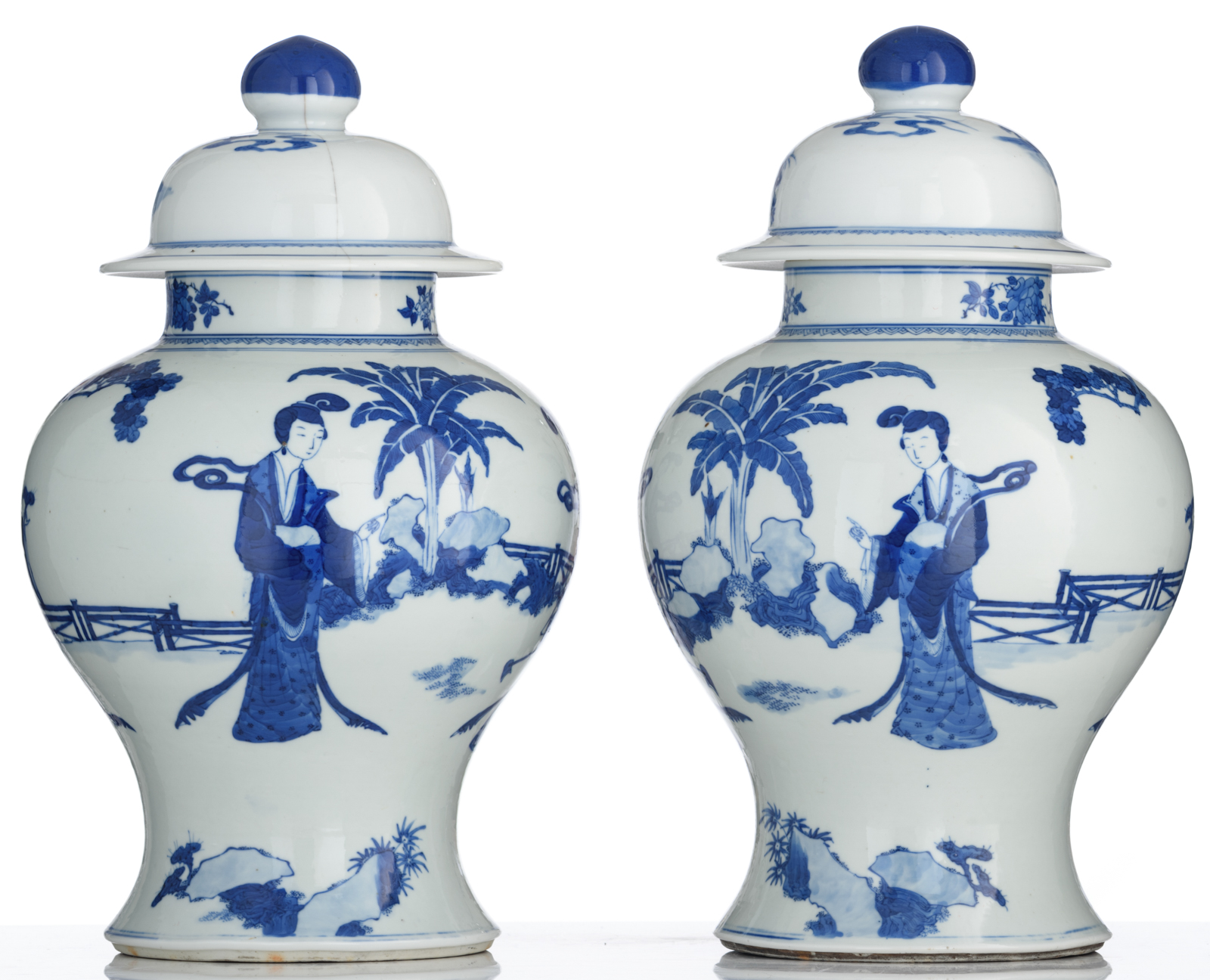 A pair of Chinese blue and white vases and covers, decorated with beauties in a garden setting, 19th - Image 3 of 8