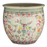 A large Chinese famille rose fishbowl, decorated with peaches, bats and shou-signs, the roundels wit