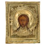 A 19thC Eastern European icon depicting Christ Pantocrator with a gilt oklad, 31 x 25,5 cm