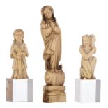 Two miniature ivory religious figures (both items glued to a plexi base): one depicting Christ falli