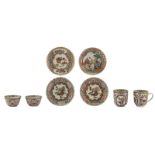 Four Chinese famille rose and gilt cups and two ditto saucers, decorated with flowers and fruits; ad