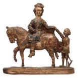 An oak sculpture of Saint Martin, with traces of polychrome paint, 17thC, possibly French, H 73 - W