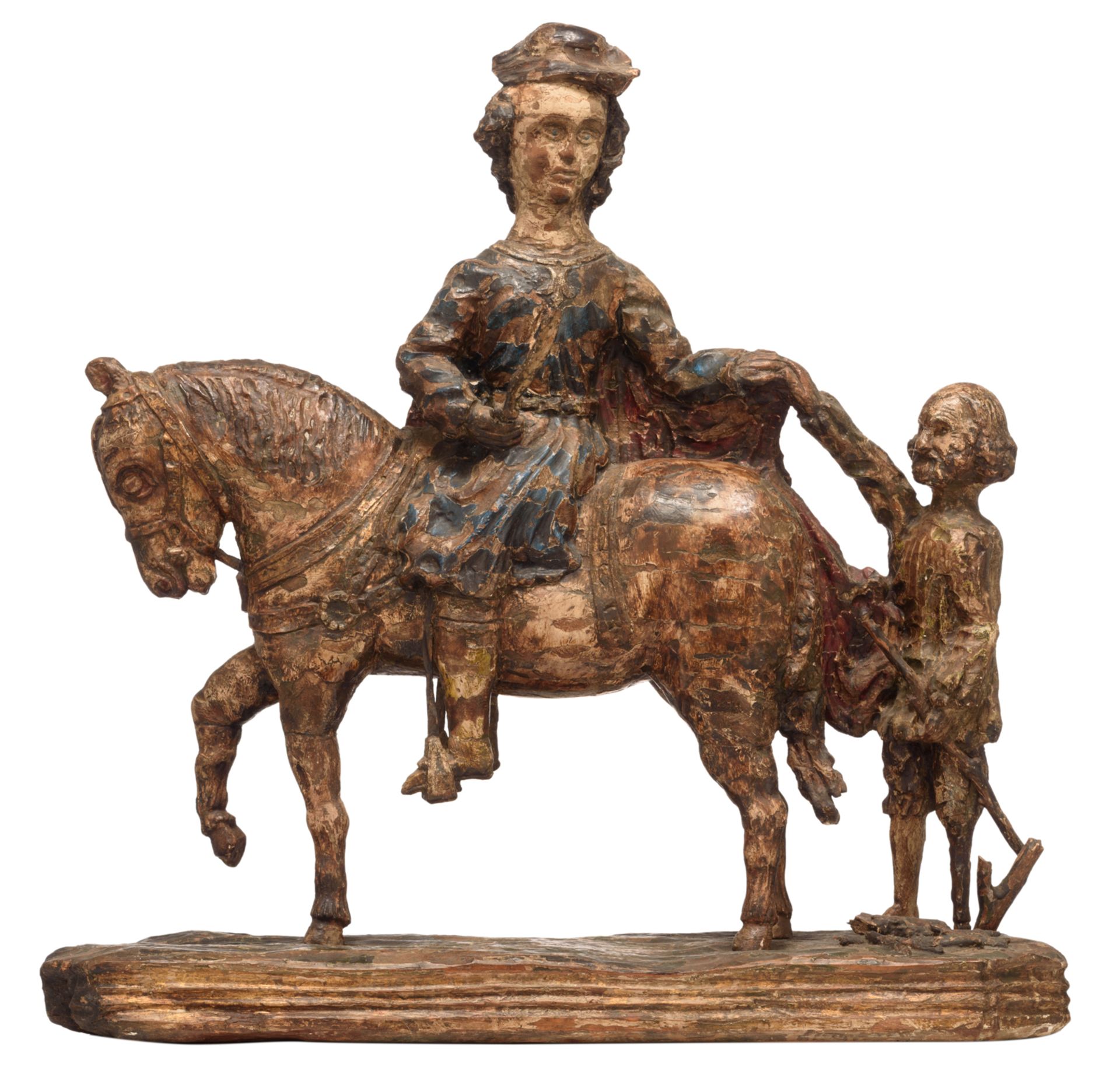 An oak sculpture of Saint Martin, with traces of polychrome paint, 17thC, possibly French, H 73 - W