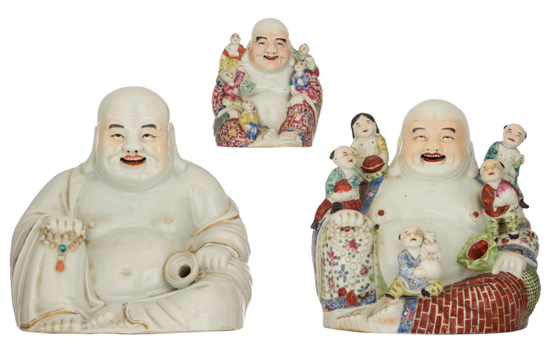 Three Chinese polychrome decorated Budai, two figures holding a chain of praying beads, two figures
