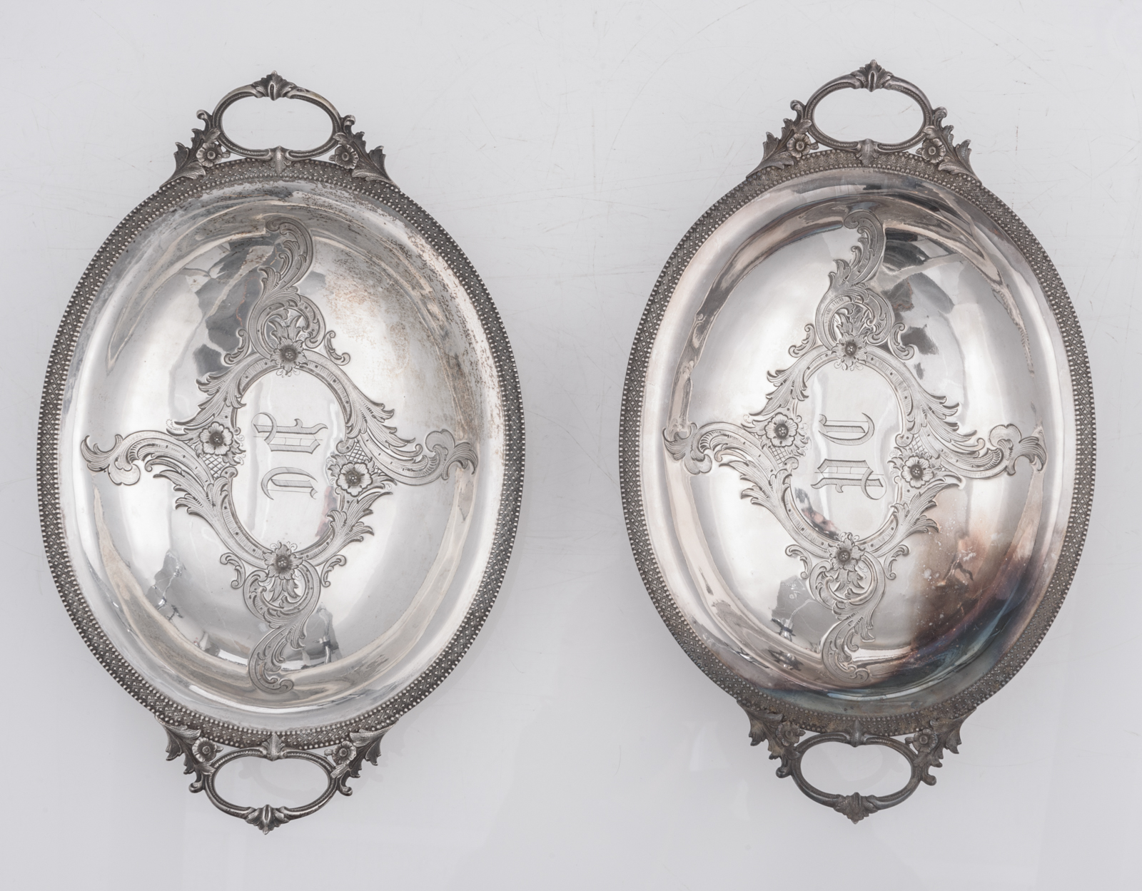 A pair of 19thC Rococo Revival silver vegetable dishes, Austro Hungarian, 13 lothige 812/000, with a - Image 6 of 11