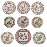 Nine Chinese famille rose floral decorated dishes, 18thC, ø 22 - 28,5 cm