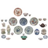 Various Chinese polychrome, Imari and blue and white dishes, cups and saucers, a ginger jar, a teapo