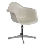 A white fibreglass shell 'PAC' armchair, design by Eames for Herman Miller, H 77,5 - W 63 cm