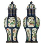 A pair of Western porcelain bleu-poudre chinoiserie covered vases, the roundels famille verte decora