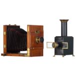 A mahogany folding camera, the lens marked 'Hermagis, Paris', H 26 cm; added a tin 'magic lantern' o