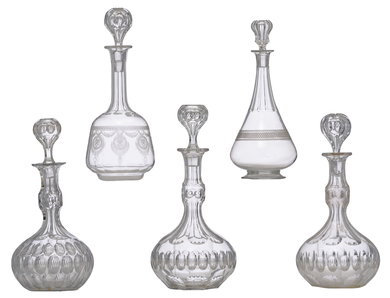 A collection of five cut crystal decanters, H 30 - 34 cm