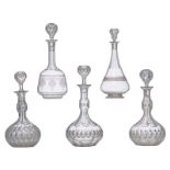A collection of five cut crystal decanters, H 30 - 34 cm