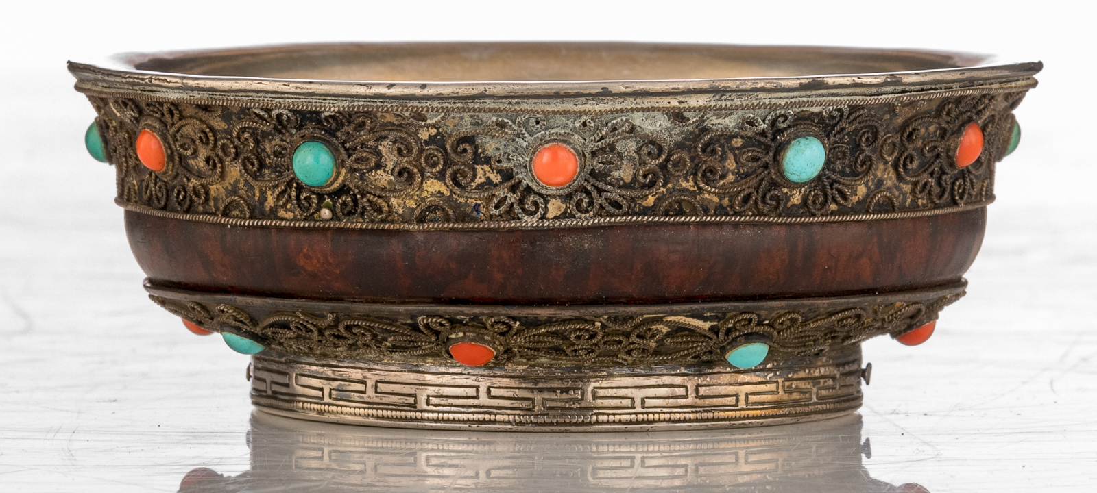 A Sino-Tibetan silver and wooden tsampa bowl, inlaid with coral and turquoise stones, the bottom rim - Image 2 of 7