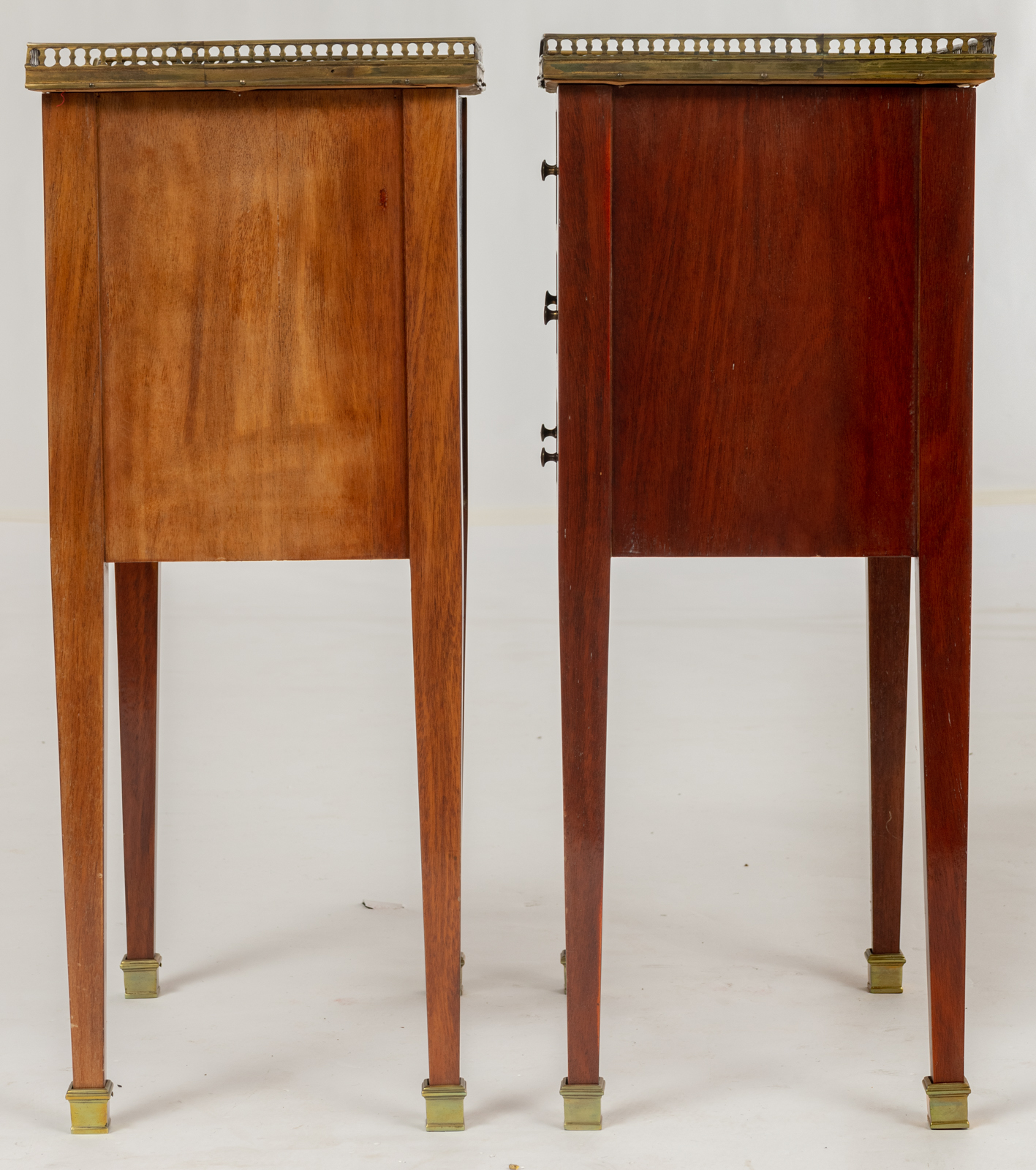 A pair of Neoclassical mahogany veneered side tables, with brass mounts and a gris Ste Anne marble t - Image 3 of 8