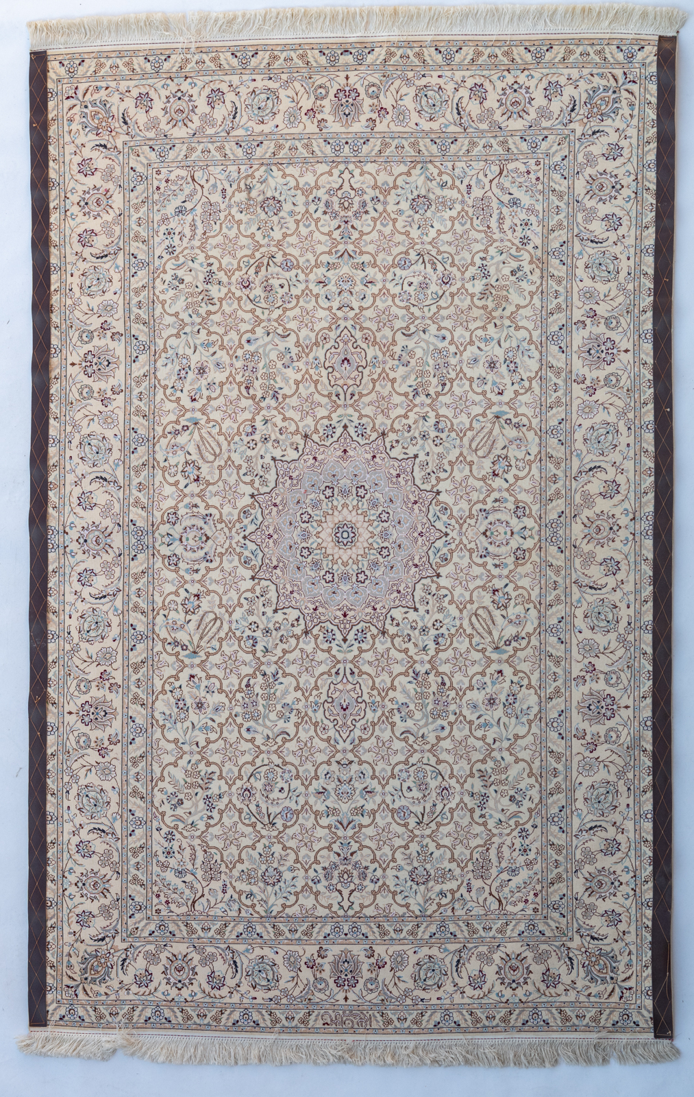 An Oriental woollen rug decorated with floral motifs, signed, 197 x 130 cm - Image 2 of 3