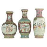 A Chinese ruby ground vase, the panels decorated with Shou Xing and boys carrying a peach; added a d