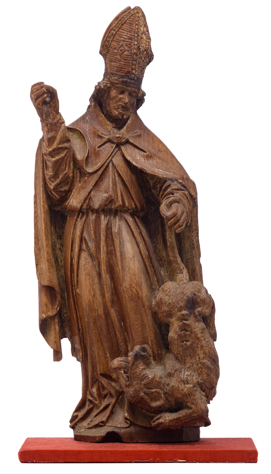 An oak sculpture of Saint Romanus of Rouen, with traces of polychrome paint, 16th/17thC, the Souther