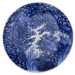 A Japanese blue and white dragon decorated plate, marked, 19thC, H 9 - ø 60,5 cm