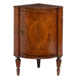 A probably German Neoclassical walnut and cherry wood marquetry veneered bow front corner cabinet, 1