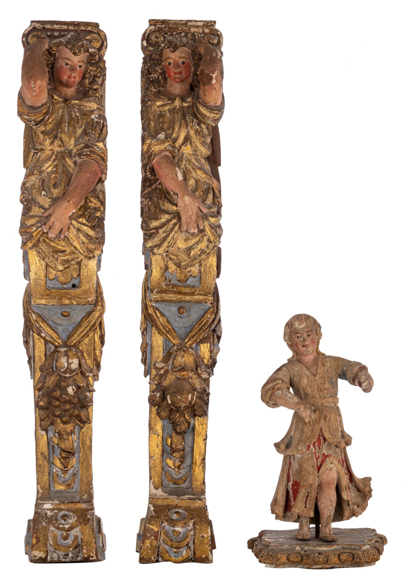 A pair of polychrome and gilt painted walnut architectural pilaster sculptures, H 89 cm; added a sma