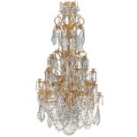 An imposing gilt bronze chandelier, royally decorated with cut crystal, H 160 - ø 82 cm