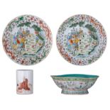 Two Chinese polychrome dishes, the centre decorated with figures, the rim with dragons; added a ditt