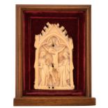 An alto relievo engraved ivory pax depicting the crucified Christ flanked by the Holy Mother and Sai