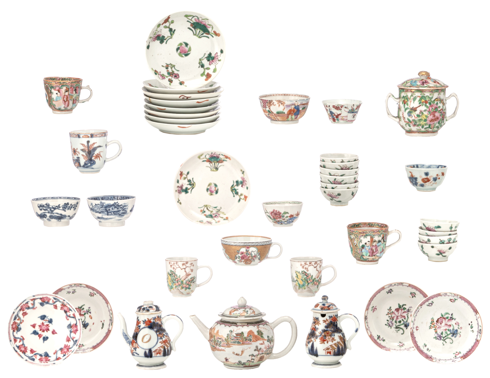 Various famille rose, blue and white, polychrome and Imari cups and saucers, two teapots and covers,