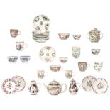 Various famille rose, blue and white, polychrome and Imari cups and saucers, two teapots and covers,