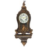A French Régence Boulle work cartel clock on a ditto base, decorated with gilt bronze mounts and a g