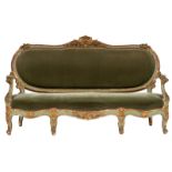 A gilt and polychrome painted oak Louis XV period settee with a (later) green velvet upholstery, H 1