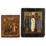 Two 20thC Eastern European icons depicting Christ surrounded by four Saints and an Archangel surroun