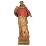 A standing figure of the founder of a monastic order with polychrome paint, limewood and paper-maché
