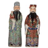 Two Chinese polychrome decorated porcelain figures, depicting Fu and Lu Xing, the Lu Xing figure wit
