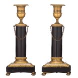 A fine pair of Louis XVI period candlesticks, Carrara marble, noir Belge marble and ormolu bronze mo