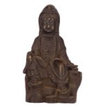 An Oriental bronze figure, depicting a seated Guanyin, H 23,5 cm