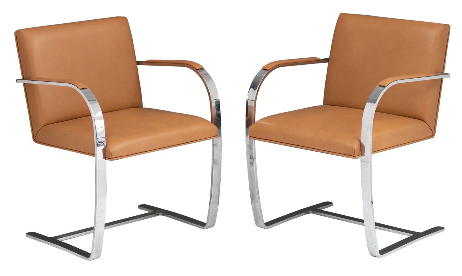 A pair of cognac leather upholstered 'Brno' armchair, design by Ludwig Mies van der Rohe for Knoll I