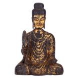An finely cast Oriental gilt bronze figure, depicting a Buddha, seated in dhayanasana, with the righ