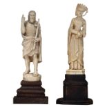 An ivory figure of Saint John the Baptist and a ditto female noble figure, both items on a matching