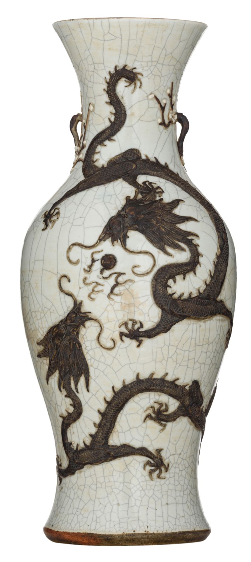 A Chinese relief crackleware vase, decorated with a crane and two dragons, chasing the flaming pearl