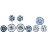 Nine Chinese blue and white dishes, decorated with antiquities, flowers and flower baskets, 18th/19t