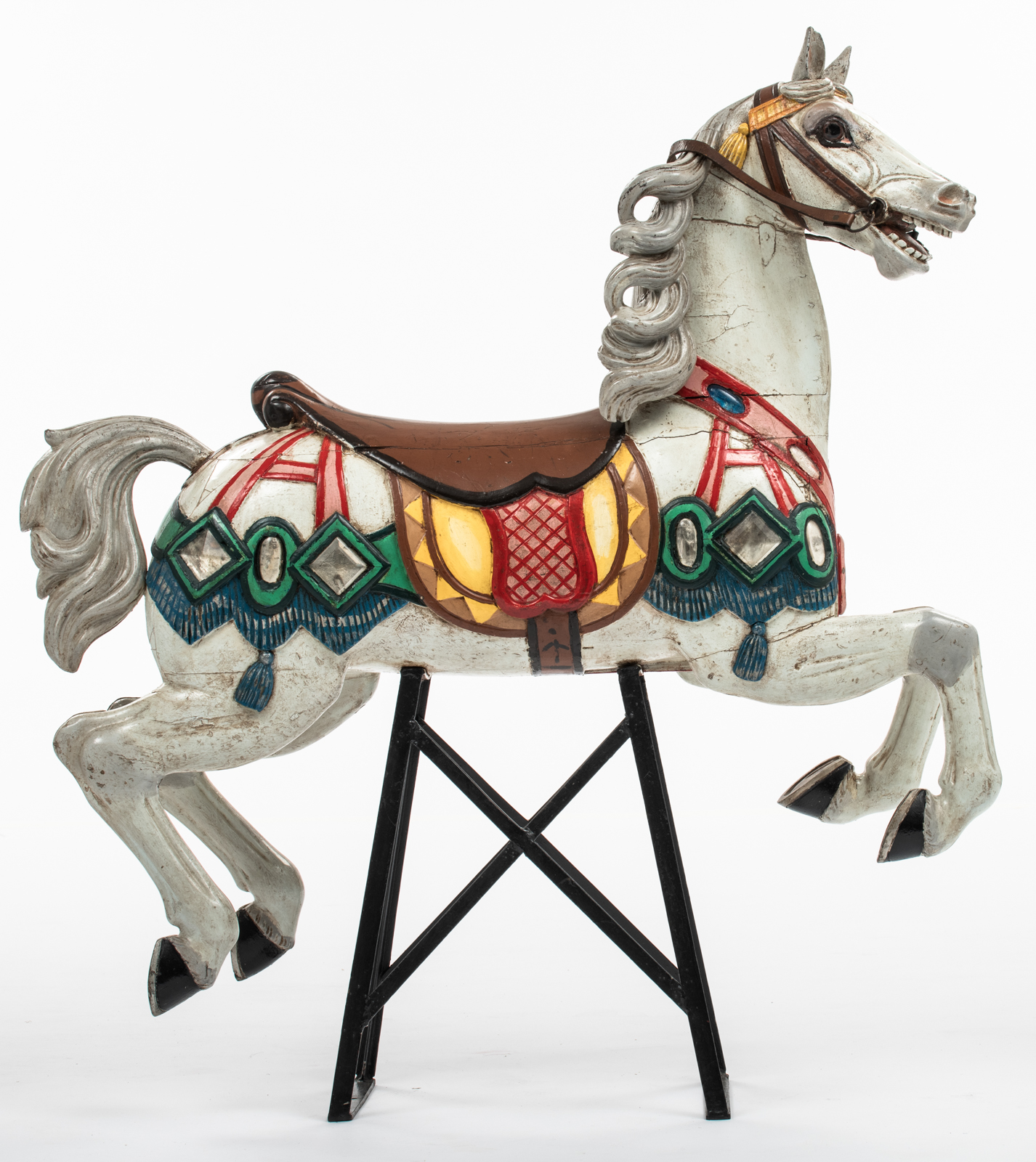 A polychrome painted carousel horse, with glass and silver foil inlay, mounted on a later period wro - Bild 2 aus 5