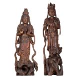 Two exotic hardwooden polychrome painted sculptures of Guanyins, H 56 - 60 cm