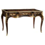 A fine Louis XV style lacquered bureau plat, decorated with gilt bronze mounts and rich marquetry of