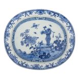 A Chinese blue and white charger, decorated with flowers, insects and antiquities, 19thC, H 6 - 39,5