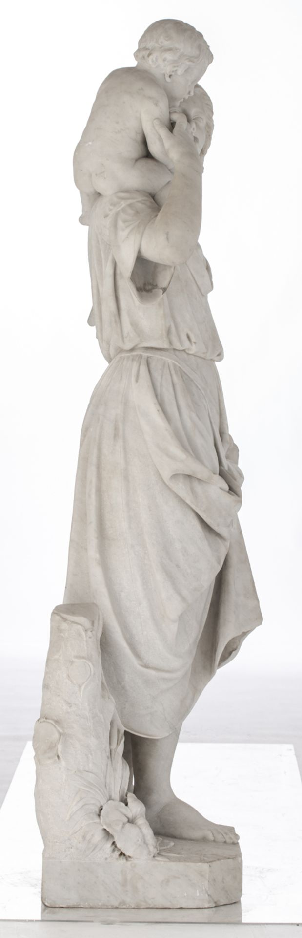 A Carrara marble sculpture of a lady holding a child and a pigeon on a ditto base, H 191 cm (incl ba - Image 4 of 5