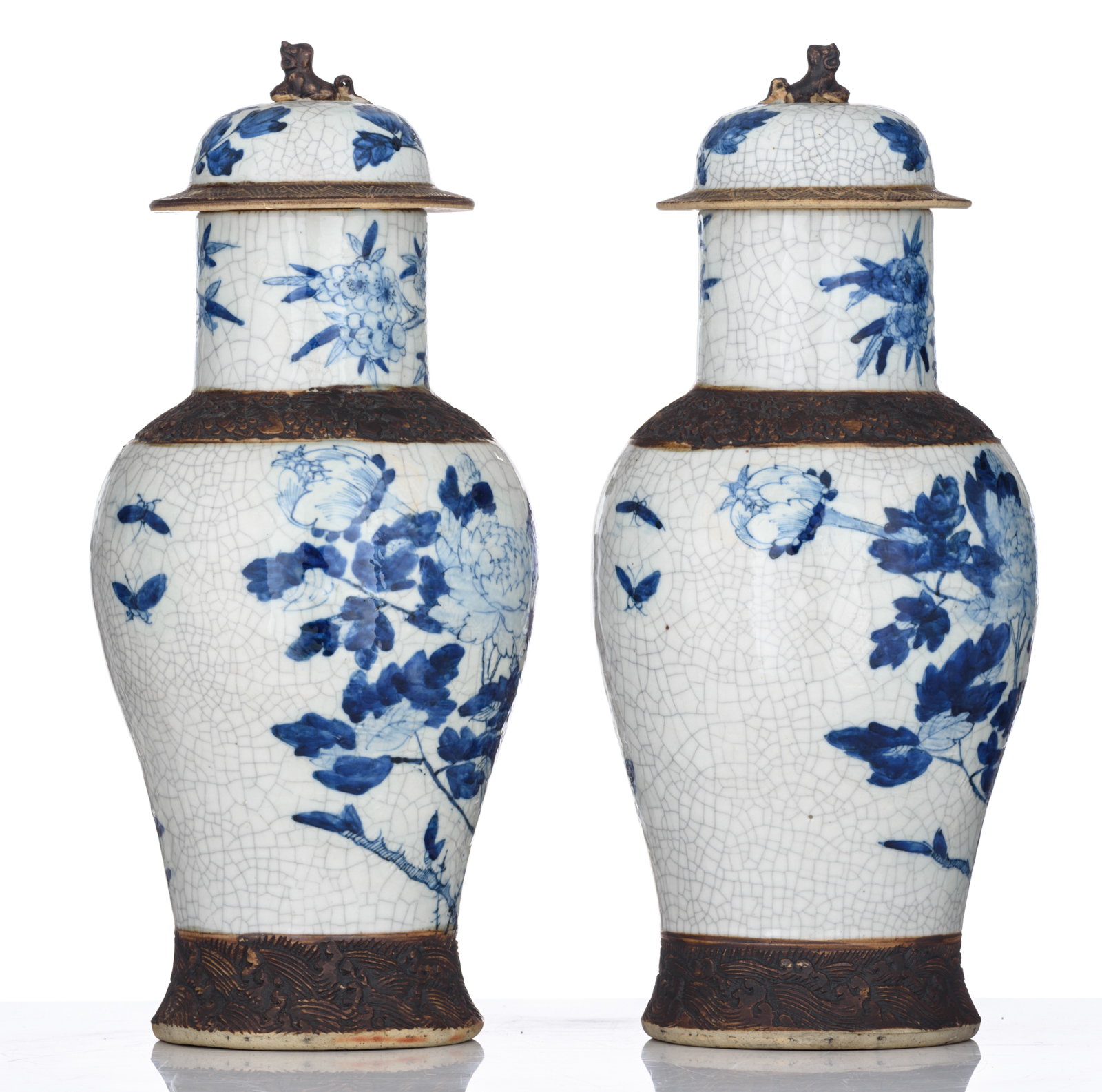 A pair of Chinese blue and white stoneware vases and covers, decorated with flowers and birds, marke - Image 3 of 10
